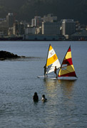 Bathers and surf sailors off Freyberg Beach, 1982